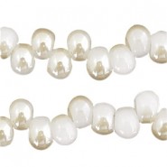 Glasperlen 6mm A-symetrisch White-half pearl shine coating